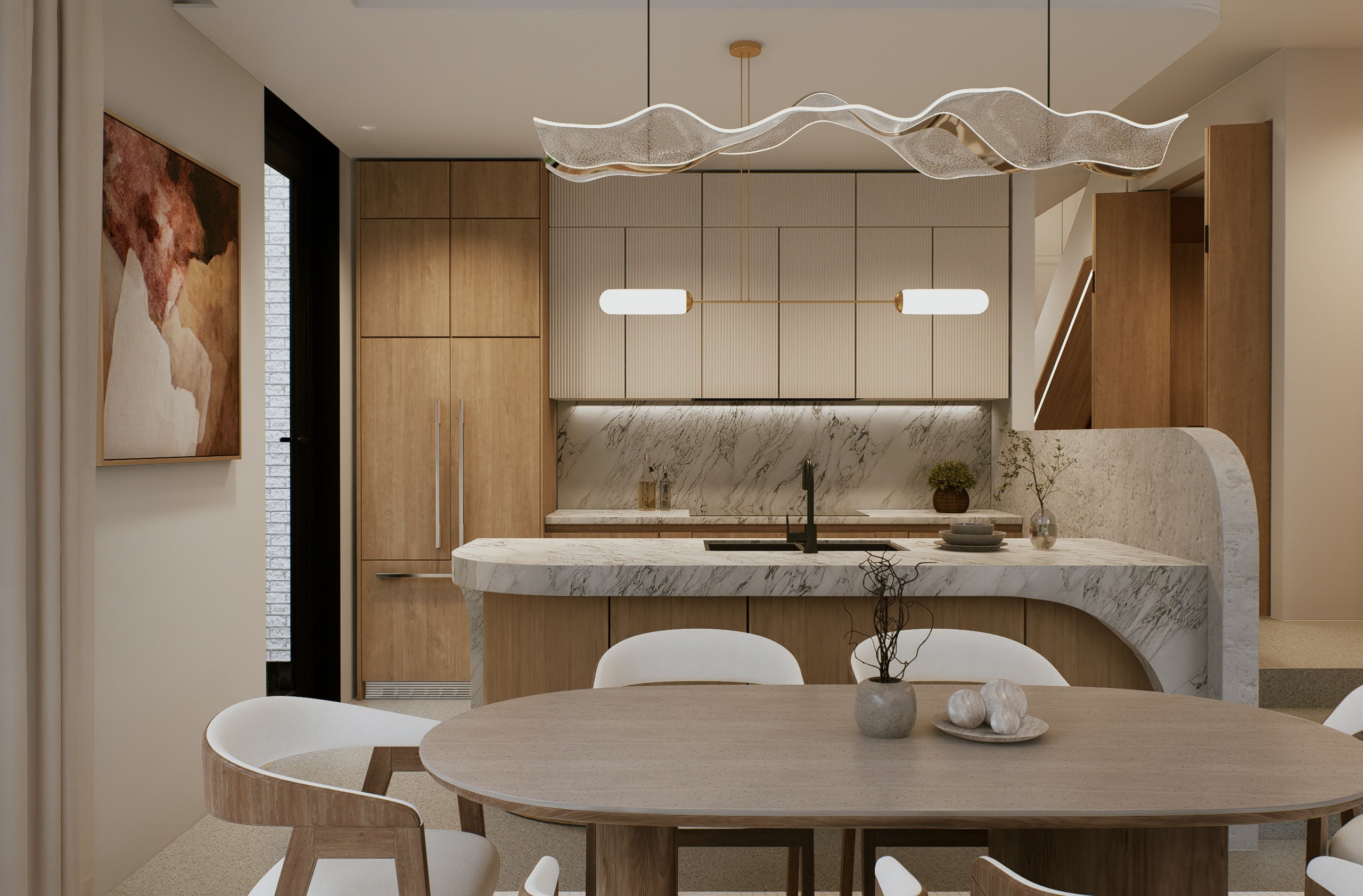 A modern kitchen and dining area featuring light wood cabinetry, a marble countertop and backsplash, a wavy white pendant light, and a round wooden dining table with white chairs.