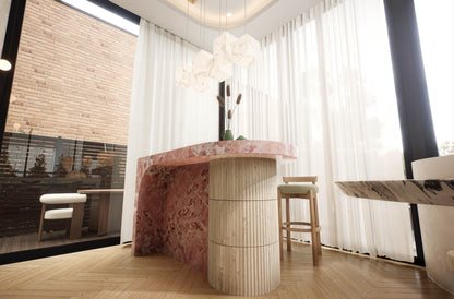 Luxury breakfast bar featuring sculptural marble counter and curved seating at 70 Cobden Melbourne by Albert Living.