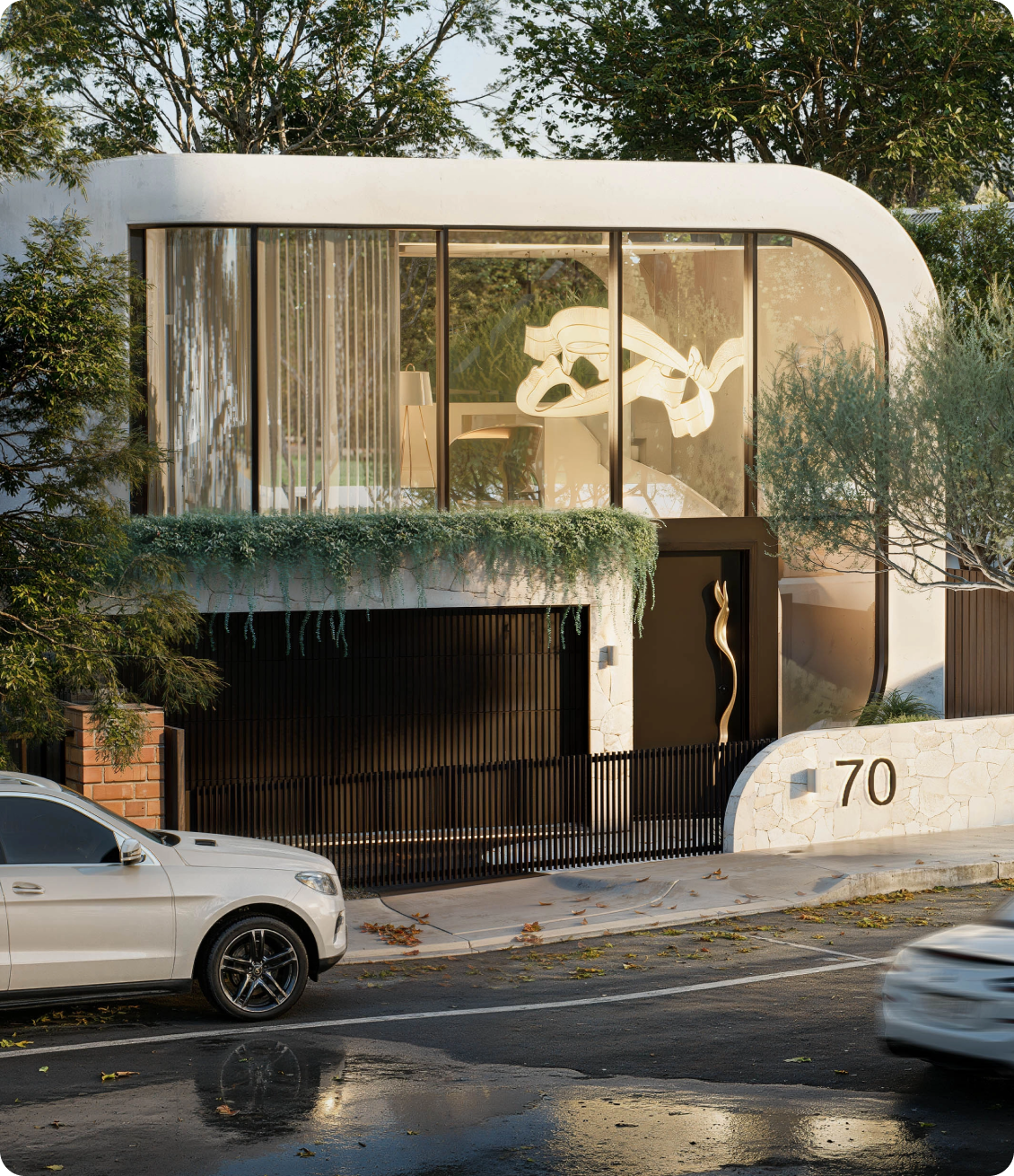 Luxury architect designed home facade featuring stone and curved forms at 70 Cobden Kew Melbourne by Albert Living