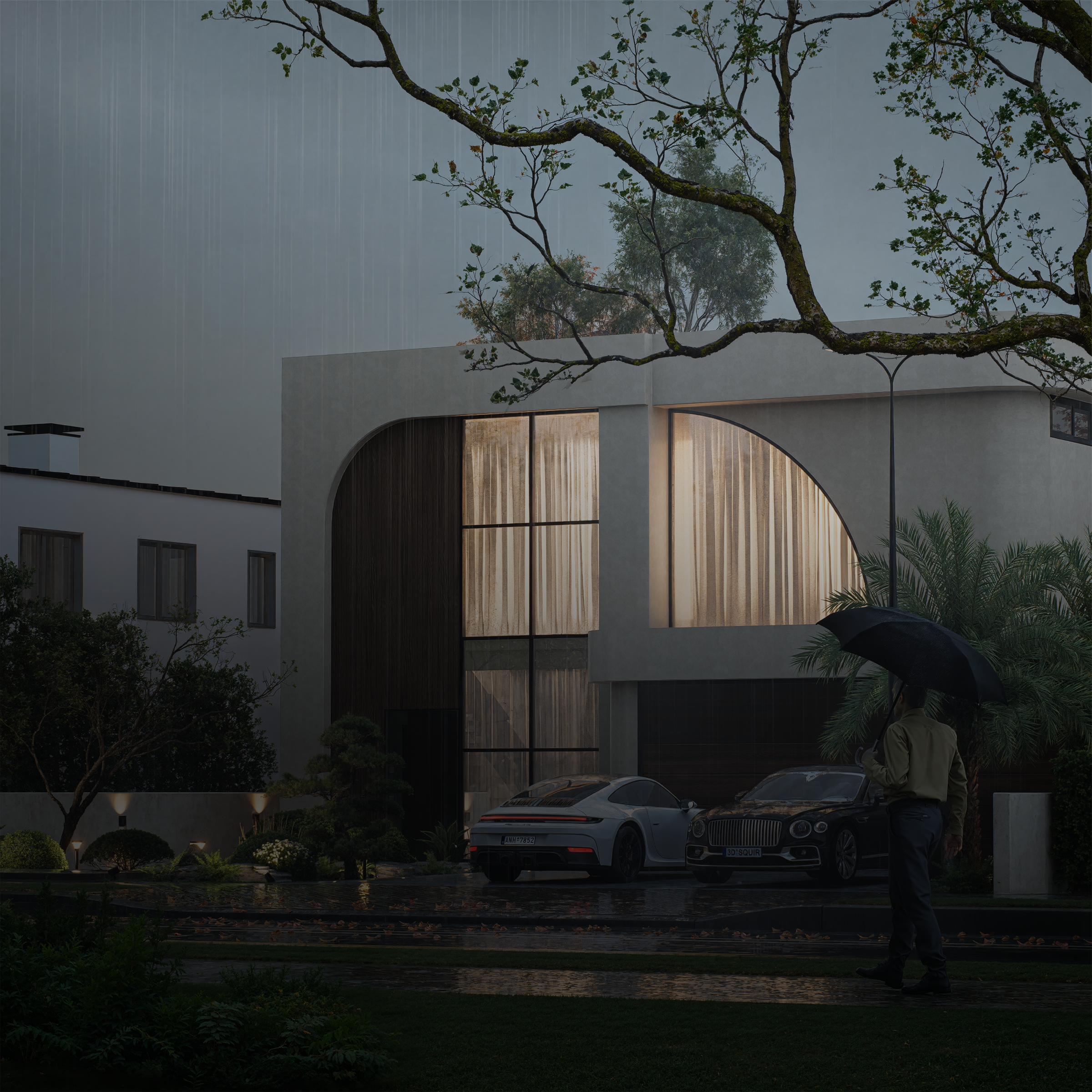 Albert Living Modern building with large glass windows at night, person holding an umbrella.